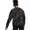 Sieviešu Sporta Krekls bez Kapuča Puma Essentials+ Animal Aop Crew Fl Mujer Melns